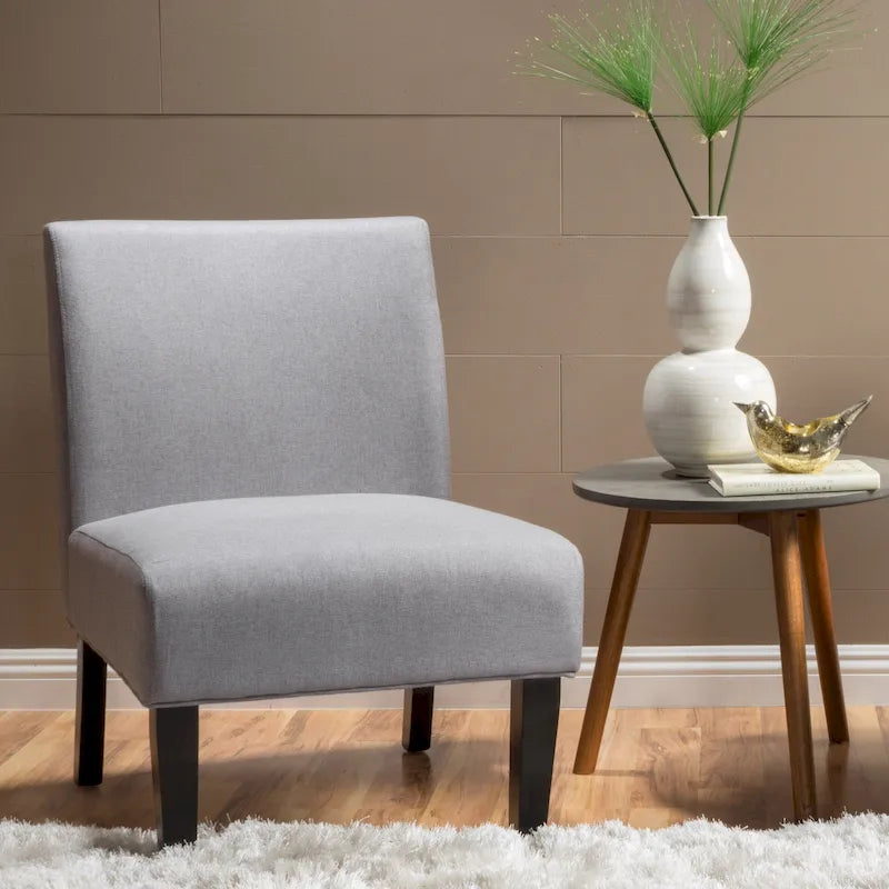 Moderne stoffen fauteuil zonder armleuningen